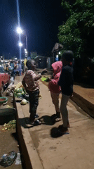 Evening street life unfolds in Bukuru, Nigeria market area