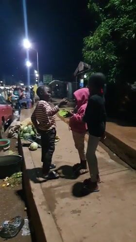 Evening street life unfolds in Bukuru, Nigeria market area