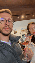 Couple shares rose wine in Omodos, Cyprus establishment