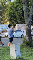 Man films jogger from roadside in Da Lat