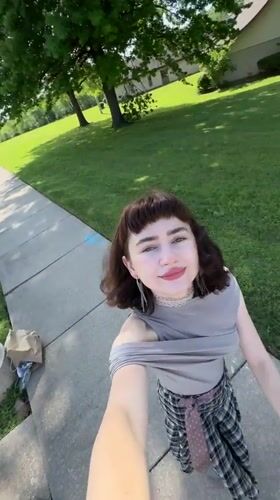 Person pushes stroller down Springfield sidewalk Sunday afternoon