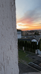 Sunset time-lapse captured over residential Belarus neighborhood