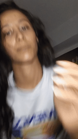 Woman poses for camera session in Porlamar indoor location