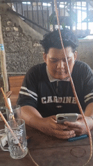 Casual warung hangout in Pati with noodles, snacks, and vapes