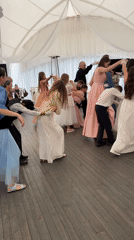 Formal children's celebration captured in Izhevsk tent venue