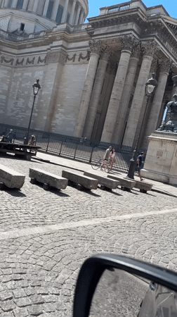 Cobblestone streets near a domed Paris landmark, from two angles.