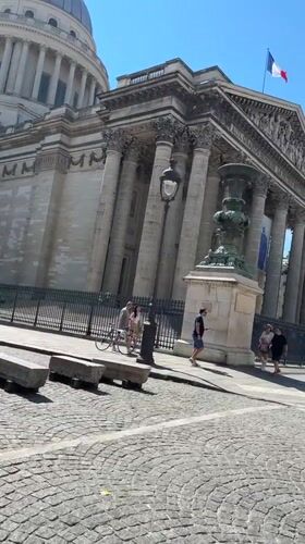 Cobblestone streets near a domed Paris landmark, from two angles.