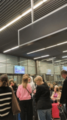 Busy early morning scene at Balice Airport departure area