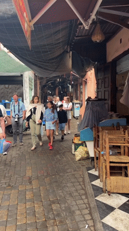 Morning foot traffic captured in Marrakesh marketplace street