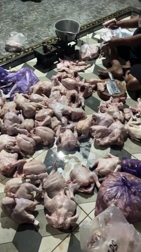 Chicken processing operation documented in Indonesian village