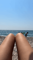 Relaxing on a pebble beach in Konyaaltı, Turkey