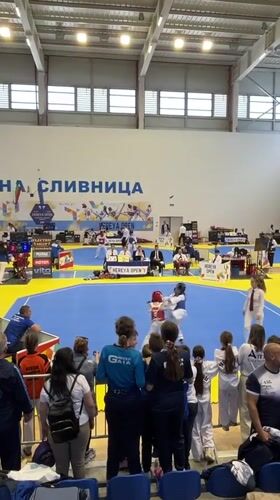Young Taekwondo competitors face off in Bulgarian gymnasium match