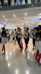 Young dancers perform traditional folk dance in Budva mall