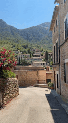 Sun-soaked streets and mountain views in Deià, Mallorca