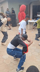 Children's birthday party celebrated outdoors in Sabon Tasha, Nigeria