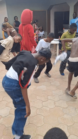 Children's birthday party celebrated outdoors in Sabon Tasha, Nigeria