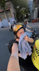 Scooter ride through busy Nha Trang street captured