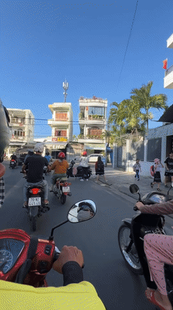 Scooter ride through busy Nha Trang street captured