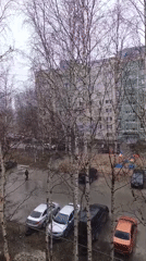 Rainy day residential courtyard observed in Nizhnevartovsk, Russia