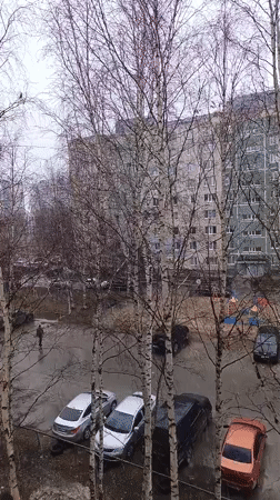 Rainy day residential courtyard observed in Nizhnevartovsk, Russia