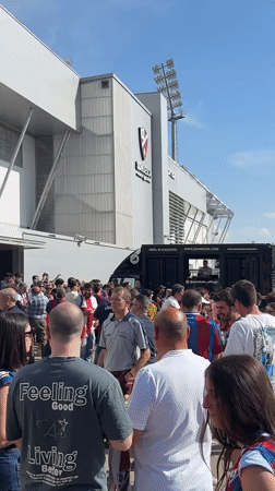Crowds gather outside Huesca stadium for sporting event