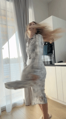 Woman takes late-night selfies in Chaikovsky kitchen