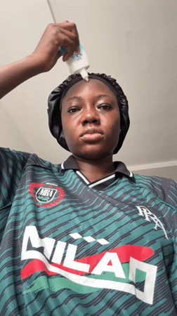 Woman documents skincare routine in Nigerian neighborhood
