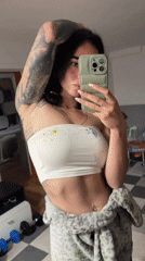 Woman Takes Mirror Selfie in Bulgarian Town