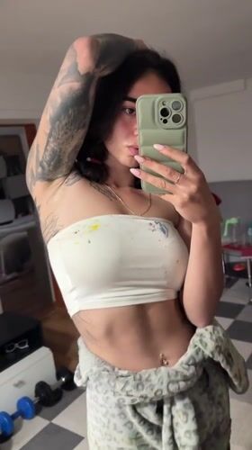 Woman Takes Mirror Selfie in Bulgarian Town
