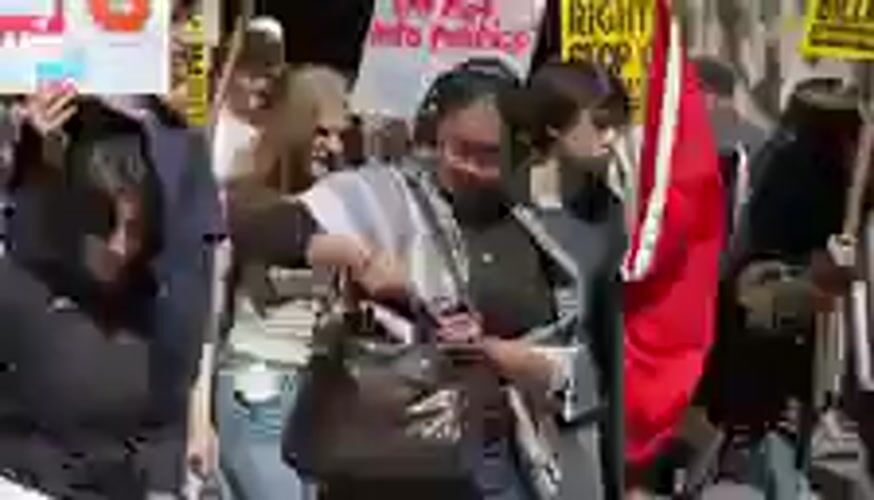 Young adults demonstrate on New York street May Day