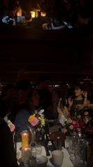 Late night gathering at decorated table in Mexico City venue