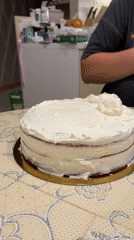Red velvet cake assembled and frosted in Yekaterinburg kitchen