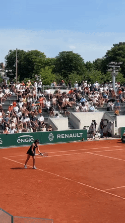 Women's tennis match recorded at Roland Garros stadium