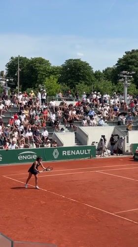 Women's tennis match recorded at Roland Garros stadium