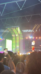 Live concert night at a London stadium, crowd in full swing