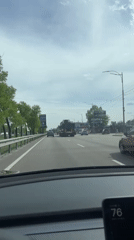 Driver records routine travel on Ukrainian road during overcast day
