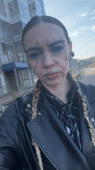 Woman with safety pin face art photographed in Krasnoyarsk
