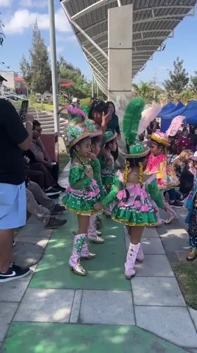 Kids in traditional costumes perform folkloric dances in Arica