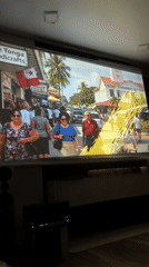 Tonga scenes projected on large screen in Kursk indoor venue