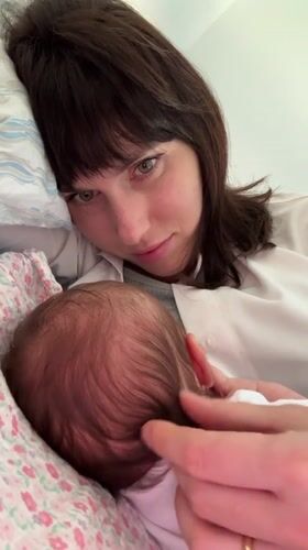 Mother and baby share tender moments in Aprilia bedroom