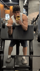 Young man documents workout session at Sofia gym