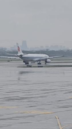 Air China A330 on wet tarmac at Hangzhou Xiaoshan Airport