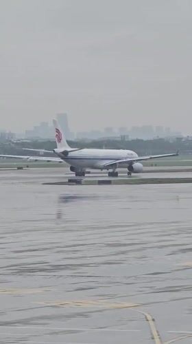 Air China A330 on wet tarmac at Hangzhou Xiaoshan Airport