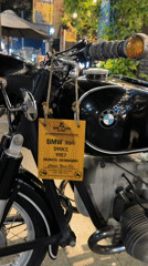Vintage BMW motorcycles on display at a Nha Trang retro bar