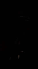 DJ performs to dancing crowd at Berlin club