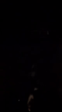 DJ performs to dancing crowd at Berlin club