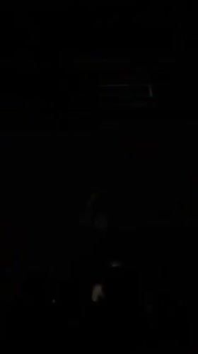 DJ performs to dancing crowd at Berlin club