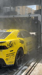 Yellow Camaro gets car wash in Monopoli, Italy
