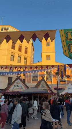 Medieval festival with merry-go-round draws crowds in Burjassot square