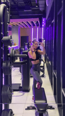 Woman takes gym selfie in Irkutsk fitness center